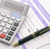Calculator on insurance claim form